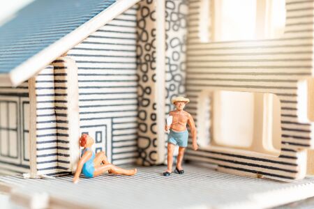 Miniature people stay at home doing self-quarantine to avoid coronavirus, , stay home conceptの写真素材