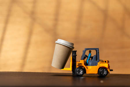 Miniature People and Coffee to-go Cup , Coffee delivery conceptの写真素材