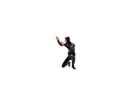 Miniature people : Scuba diver isolated on white background