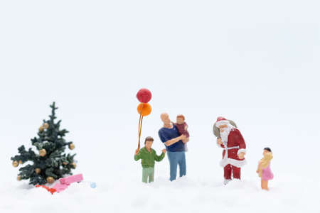 Miniature people, Santa claus and gifts for kid , Christmas and Happy New Year concept.の写真素材