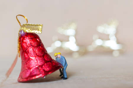 Miniature people,  Worker team working with a Christmas decoration , Christmas and Happy New Year...