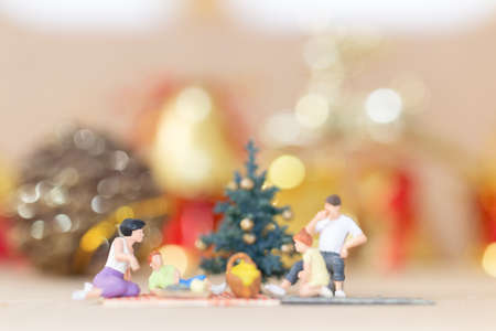Miniature people, Happy family celebrating A Christmas  , Christmas and Happy New Year concept.の写真素材