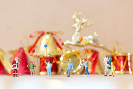 Miniature people, Happy family celebrating A Christmas  , Christmas and Happy New Year concept.の写真素材