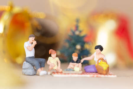 Miniature people, Happy family celebrating A Christmas  , Christmas and Happy New Year concept.の写真素材