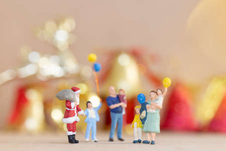 Miniature people, Happy family celebrating A Christmas  , Christmas and Happy New Year concept.の写真素材