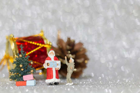 Miniature people, Happy family celebrating A Christmas  , Christmas and Happy New Year concept.