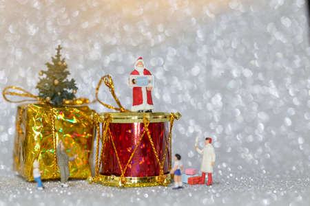 Miniature people, Happy family celebrating A Christmas  , Christmas and Happy New Year concept.の写真素材