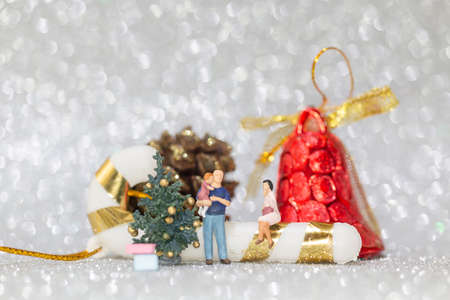 Miniature people, Happy family celebrating A Christmas  , Christmas and Happy New Year concept.の写真素材