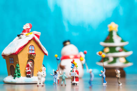 Miniature people, Happy family celebrating A Christmas  , Christmas and Happy New Year concept.の写真素材