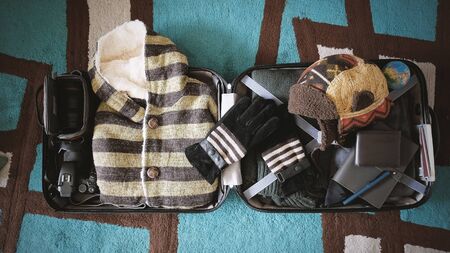 Top View Open suitcase Travel Concept, Vintage Style, Empty Space.の写真素材