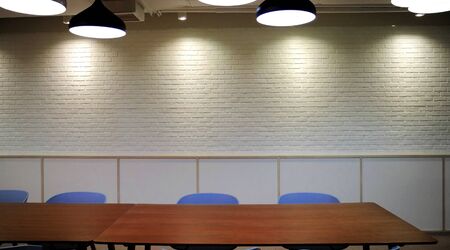 Front View Brick Wall With Lamp Light in Room, Loft Style Decoration, Empty Space.