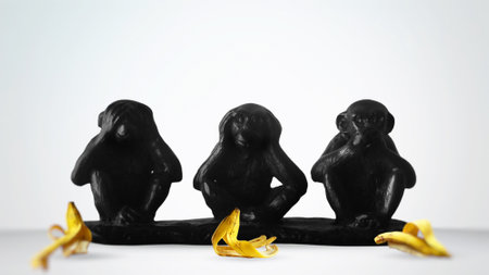 Three Wise Monkeys Sculpture, Monkeys Closing eyes ears mouthの写真素材