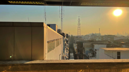 View of the city from the roof of the building in the evening