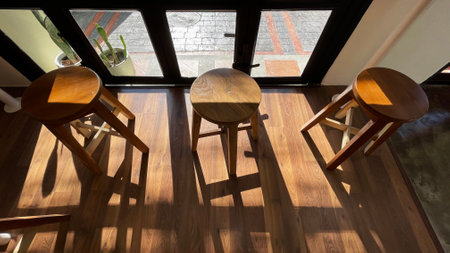 Wooden Chairs and Table in a Cafe with a large window, Cafe Chairの写真素材