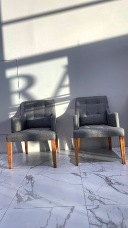 Armchairs With Sunlight, Gray Armchairs in the interior of a room with Sunlight...,の写真素材