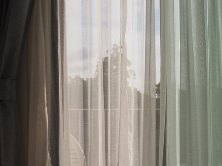 White curtain on the window in the morning, interior design concept.の写真素材