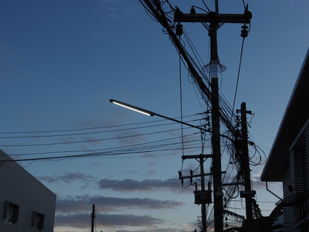 Electrical pole with power lines in the city of Bangkok, Thailandの写真素材