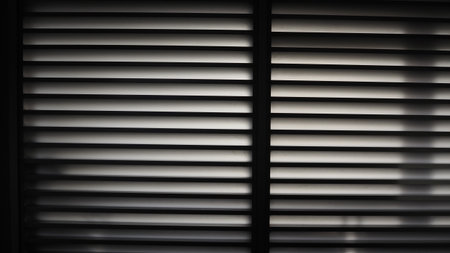 Window blinds in dark tone. Abstract background and texture for design.の写真素材