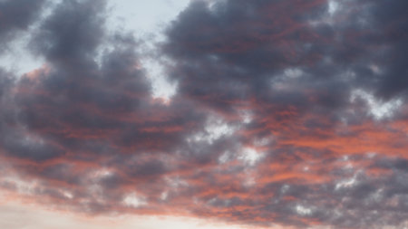 Cloudscape, Colored Clouds at Sunset near the Ocean as a Backgroundの写真素材