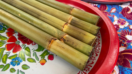 Sugar cane on a plate in a market in Peru, South Americaの写真素材