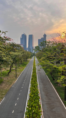 Modern office building and green leaves in the city. Business concept.の写真素材