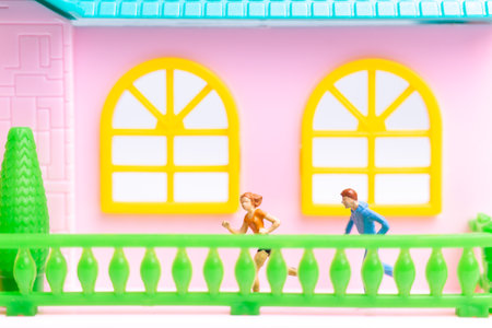 Miniature people , Couple running near their house together , Healthy lifestyle conceptの写真素材