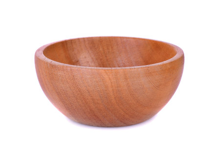 empty wooden bowl on white backgroundの写真素材