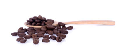coffee bean in wooden spoon on white backgroundの写真素材