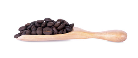coffee bean in wooden spoon on white backgroundの写真素材