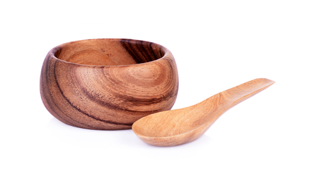 wooden bowl and spoon isolated on white background.の写真素材