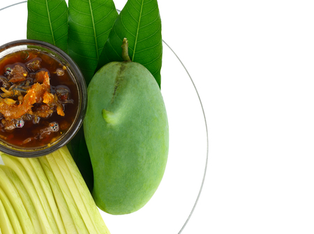 Raw mangoes sour with Sweet fish sauceの写真素材