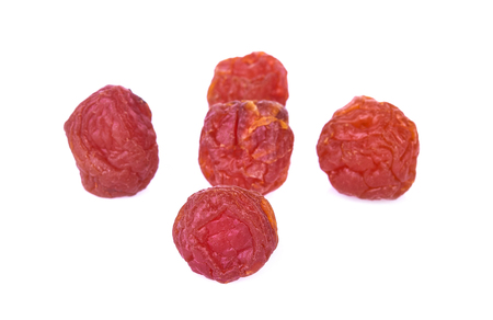 dried apricot plum fruits on white backgroundの写真素材
