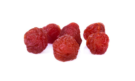 dried apricot plum fruits on white backgroundの写真素材