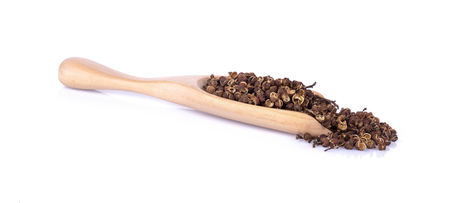 Dry Zanthozylum limonella Alston in wooden spoon on white backgroundの写真素材