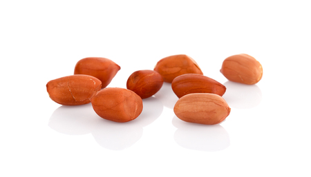 Peanuts, nuts in shells on white backgroundの写真素材