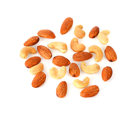 Almonds and cashews nut isolated on a white backgroundの写真素材