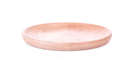 empty wooden plate on white background.の写真素材