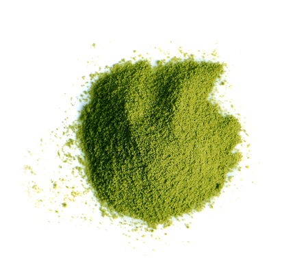Powdered matcha green tea on white backgroundの写真素材
