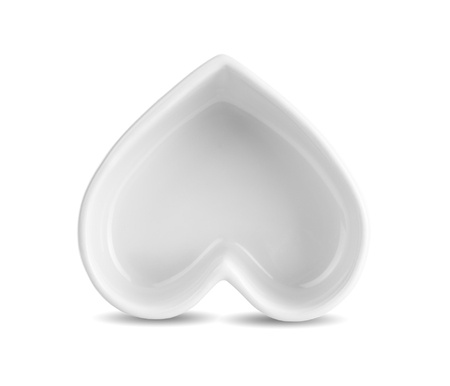 white heart shaped ceramic bowls isolated on white backgroundの写真素材