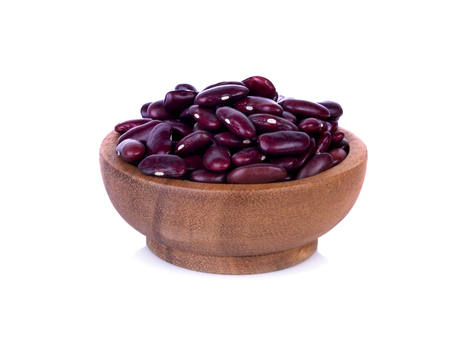 red beans in wooden bowl isolated on white background.の写真素材
