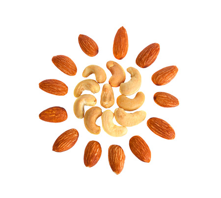 Almonds and cashews nut isolated on a white background. top viewの写真素材