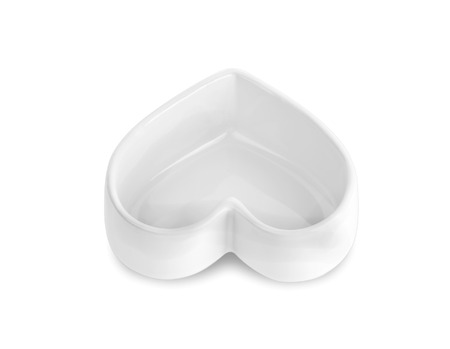 white heart shaped ceramic bowls isolated on white backgroundの写真素材