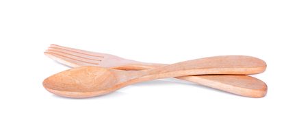 wooden spoon and fork on white backgroundの写真素材