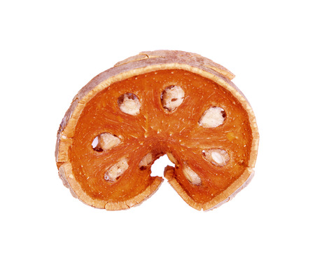 Dry Bael slices fruit isolated in white background. Dry herb for healthy beverage.の写真素材