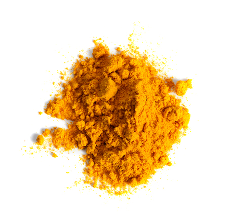 Turmeric (Curcuma) powder pile isolated on white background, top viewの写真素材
