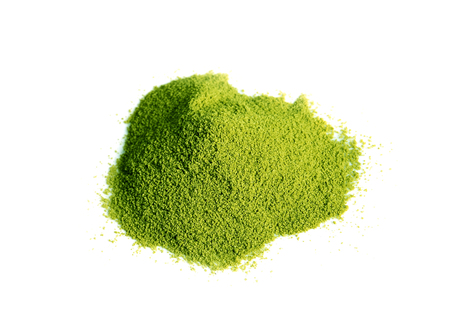 Powdered matcha green tea on white backgroundの写真素材