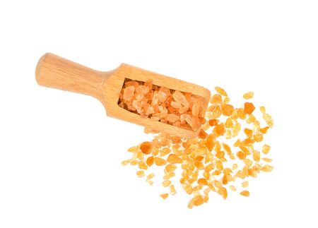 Chrystals Sugar,Brown cane sugar isolated on white background.の写真素材