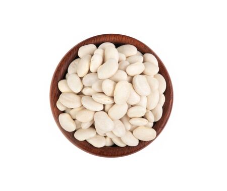White kidney beans in wooden plate isolated on white backgroundの写真素材