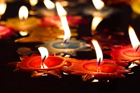 Red Candle with Roses in templeの写真素材