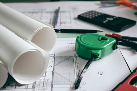 Equipment,design tools and blueprint are full of architects' desks.
